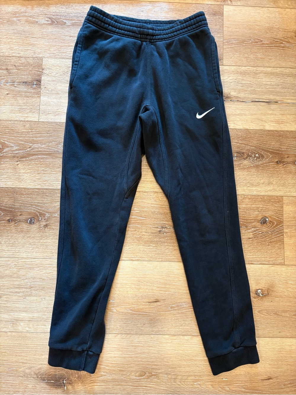 Nike Men’s Black Jogger Sweatpants with White Swoosh. Size Small